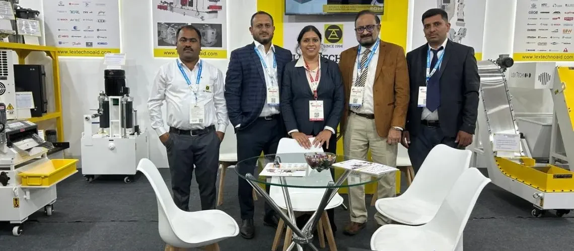 ezgif-7b2e05d44e50dc Lex Technoaid team group photo at IMTEX 2025 booth